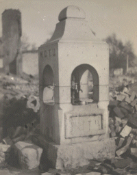 Bad black and white photo of a stone waterfountain during the prohibition.